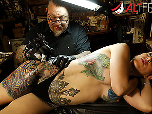 Marie Bossette gets a painful tattoo on her leg